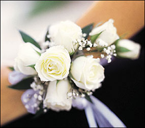 7 White Mini Roses Wristlet from Nate's Flowers in Casper, WY
