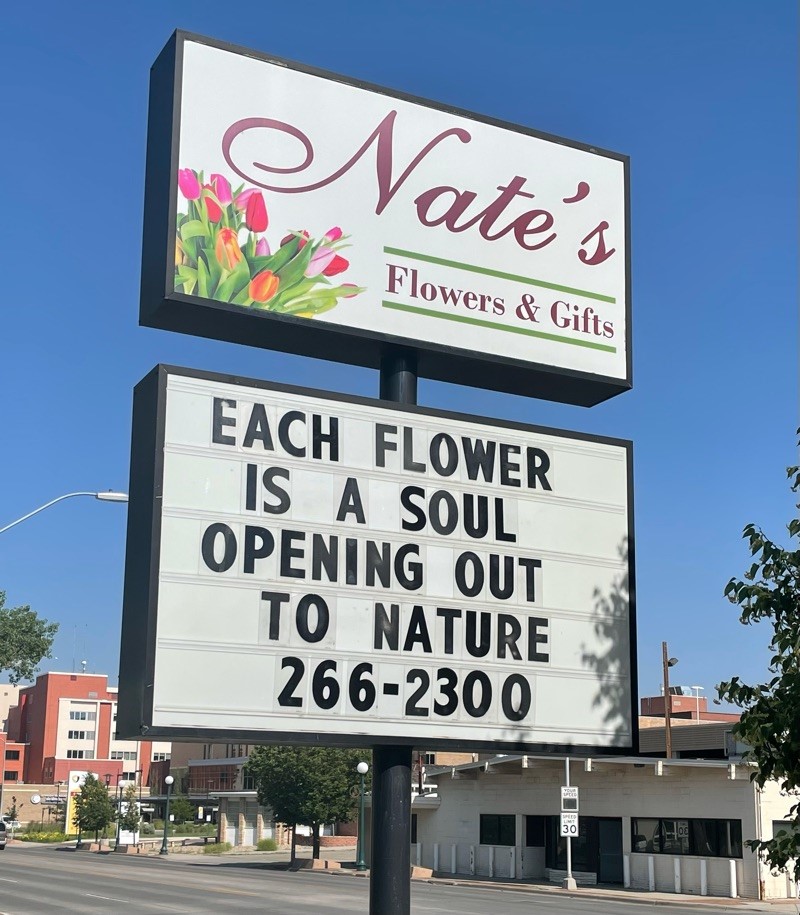 Check out the Nate's Flowers & Gifts sign!